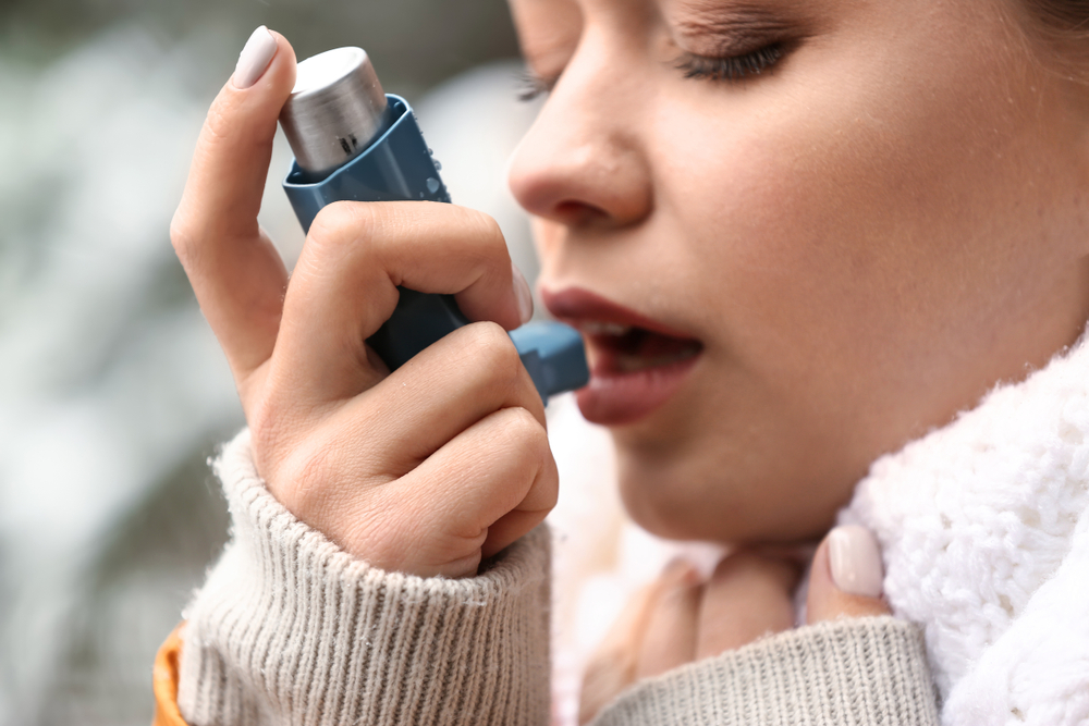 Young,Woman,With,Inhaler,Having,Asthma,Attack,Outdoors,,Closeup